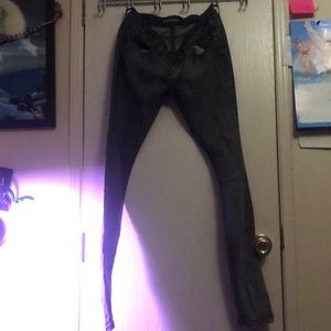 Grey slightly distressed skinny jeans